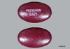 Image of a Premarin 0.625mg pill. The pill is blood red.